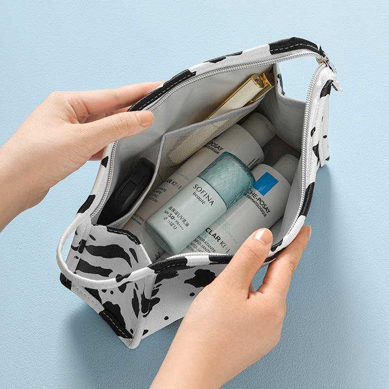 Wholesale Portable Storage Waterproof PU Cow Pattern Makeup Bag